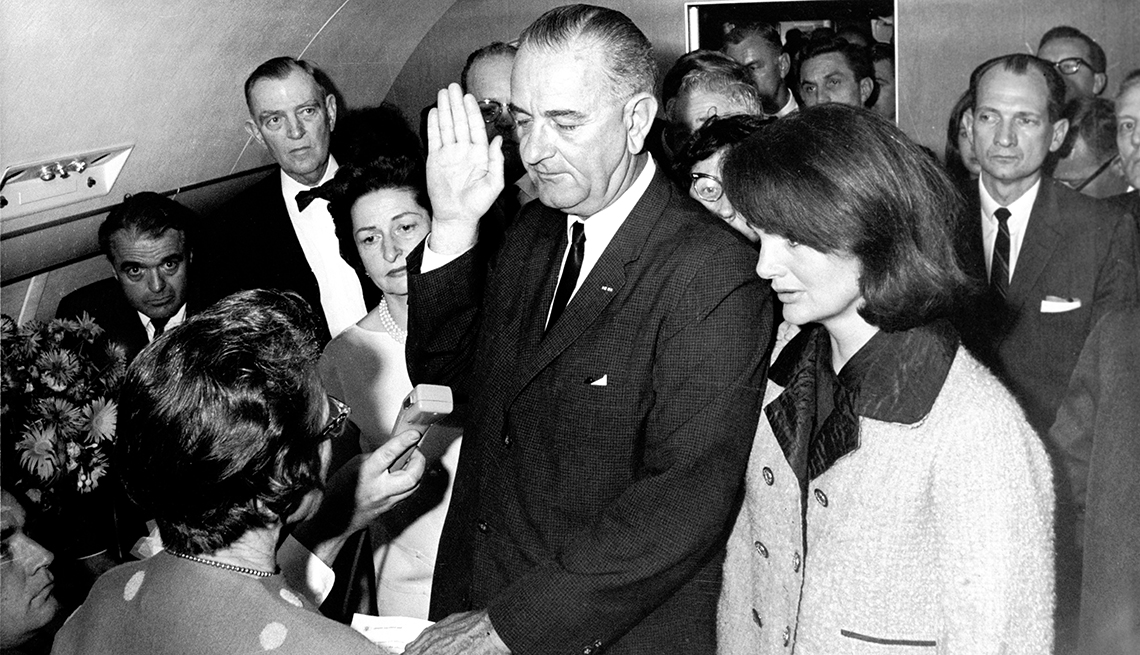 First Lady On Air Force One Stands By Lyndon B Johnson As He Is Sworn In As President After Kennedy's Assasination, Jackie O, First Lady, 1963 Was a Year With Lasting Impact, AARP Politics, Events And History