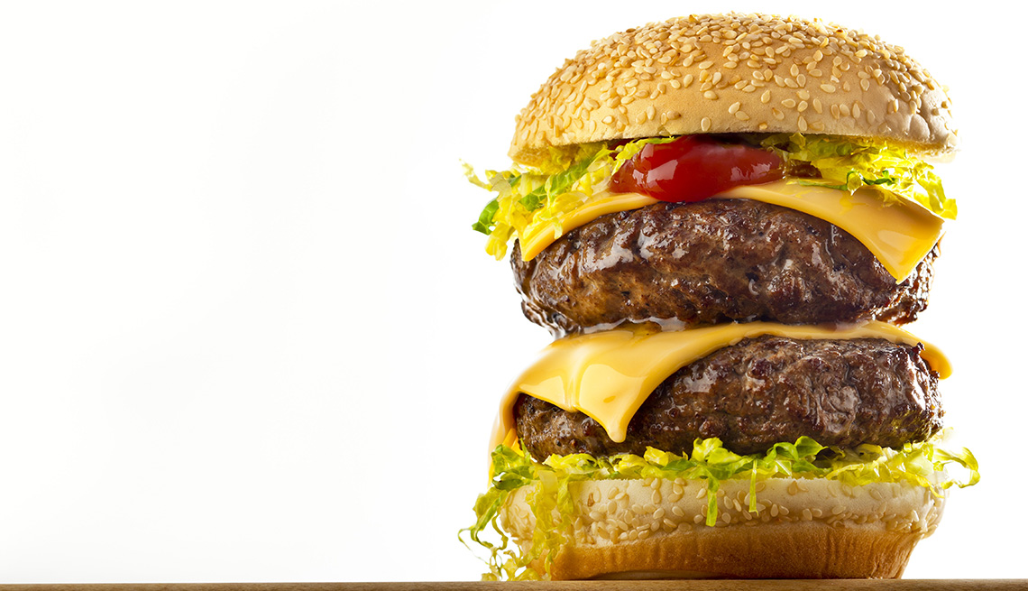 Close Up Of A Two Patty Cheeseburger, Foods To Avoid Before Flying