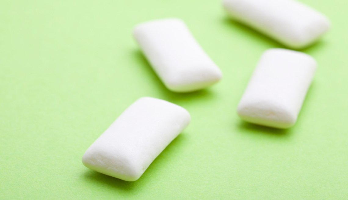 Close Up Of Gum On Green Background, Foods To Avoid Before Flying