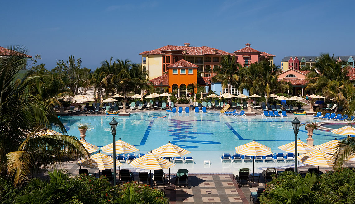 View Of The Pool And Hotel In Background At A Sandals Resort, Second Honeymoon Destinations