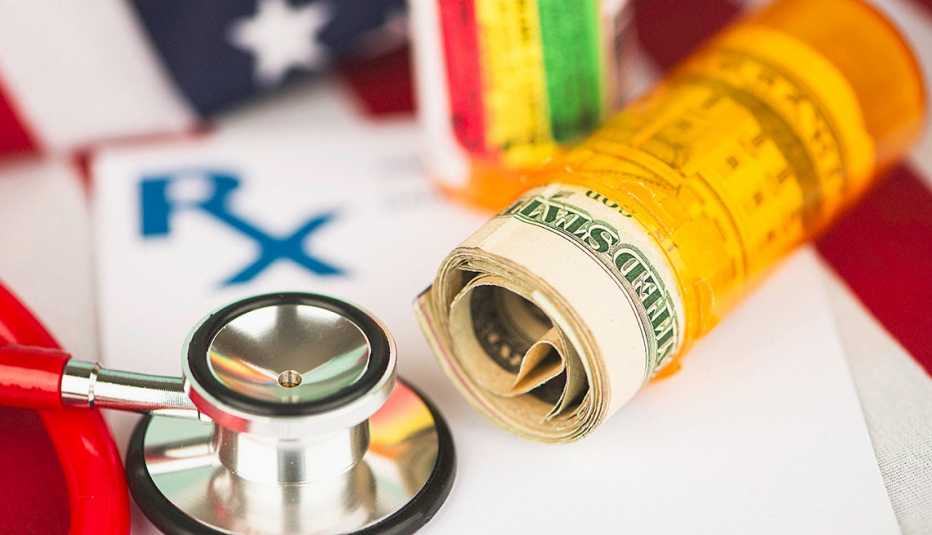 Pills and money on the American flag