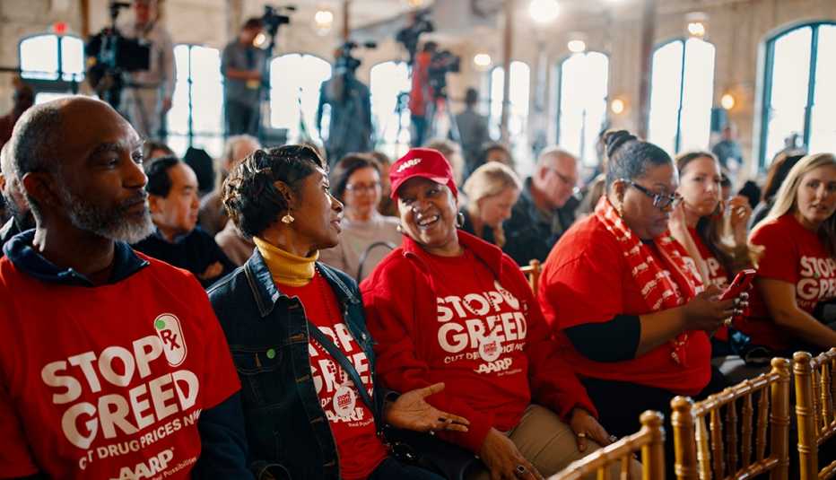 Volunteers in red shirts attend a campaign event in South Carolina