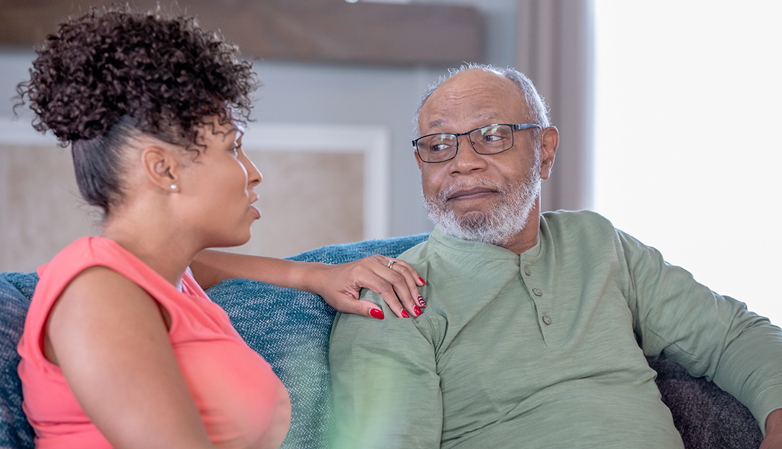 Woman having a serious talk with her father