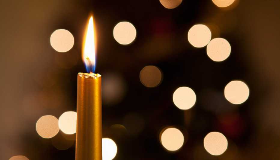 Candle with holiday lights