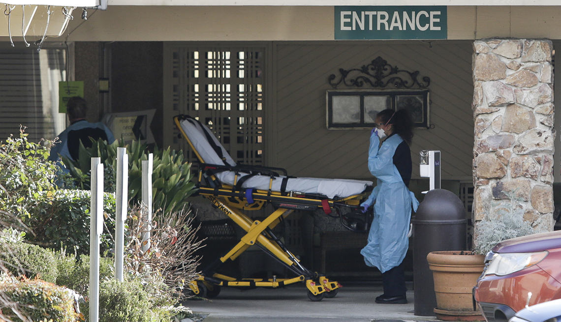 A person moves a stretcher