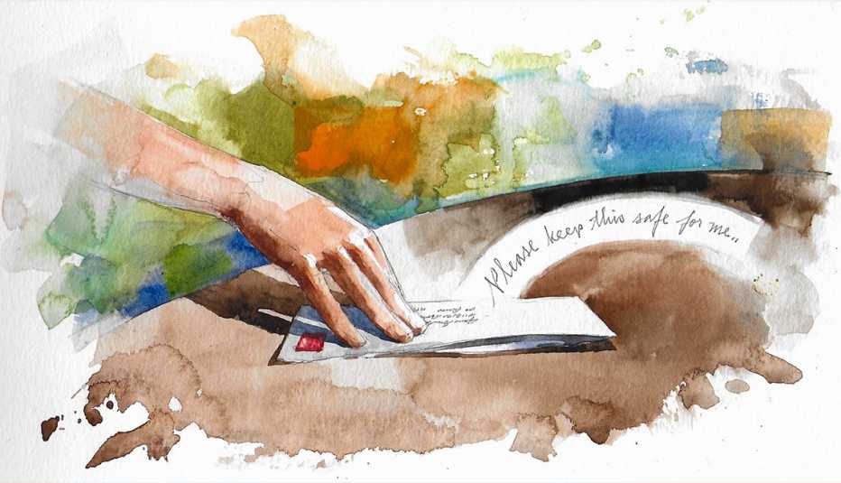 a hand hand on an envelope