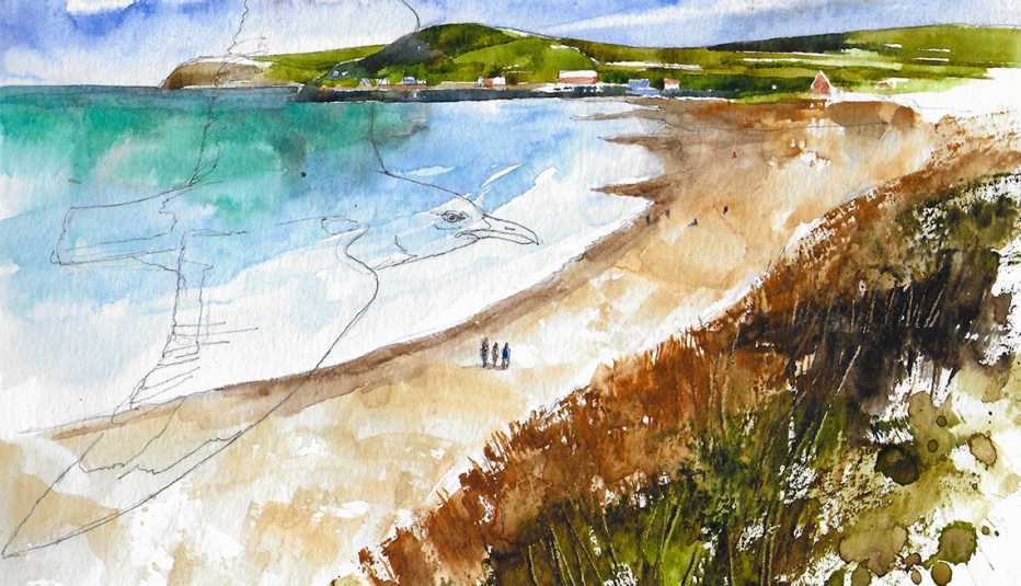 three people walking on a beach with a bird flying overhead