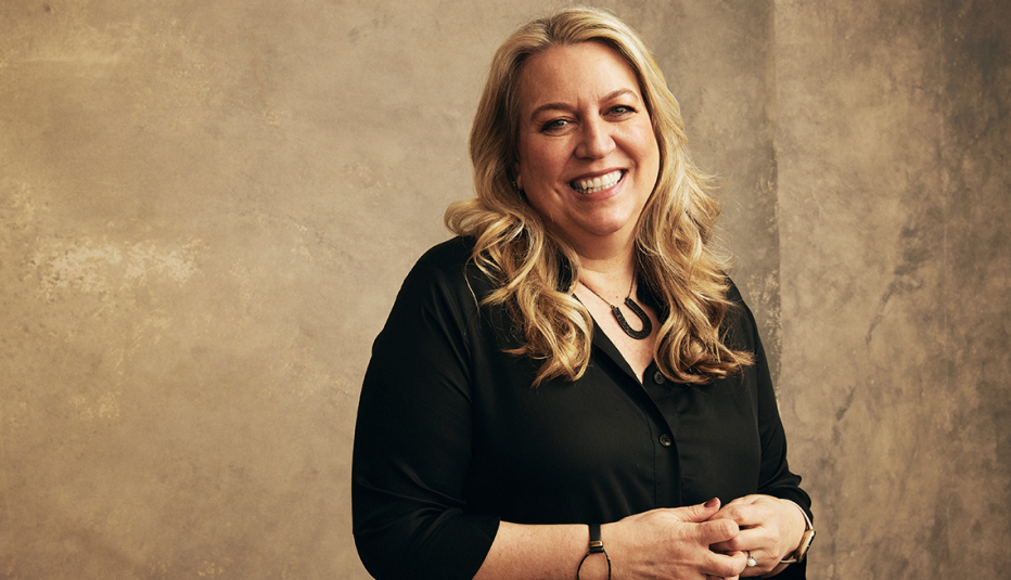 cheryl strayed against tan background