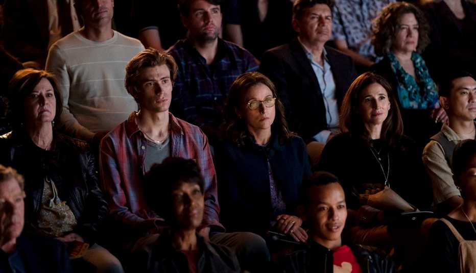 owen teague as elliot, julia louis-dreyfus as beth and michaela watkins as sarah sitting in audience in still from you hurt my feelings