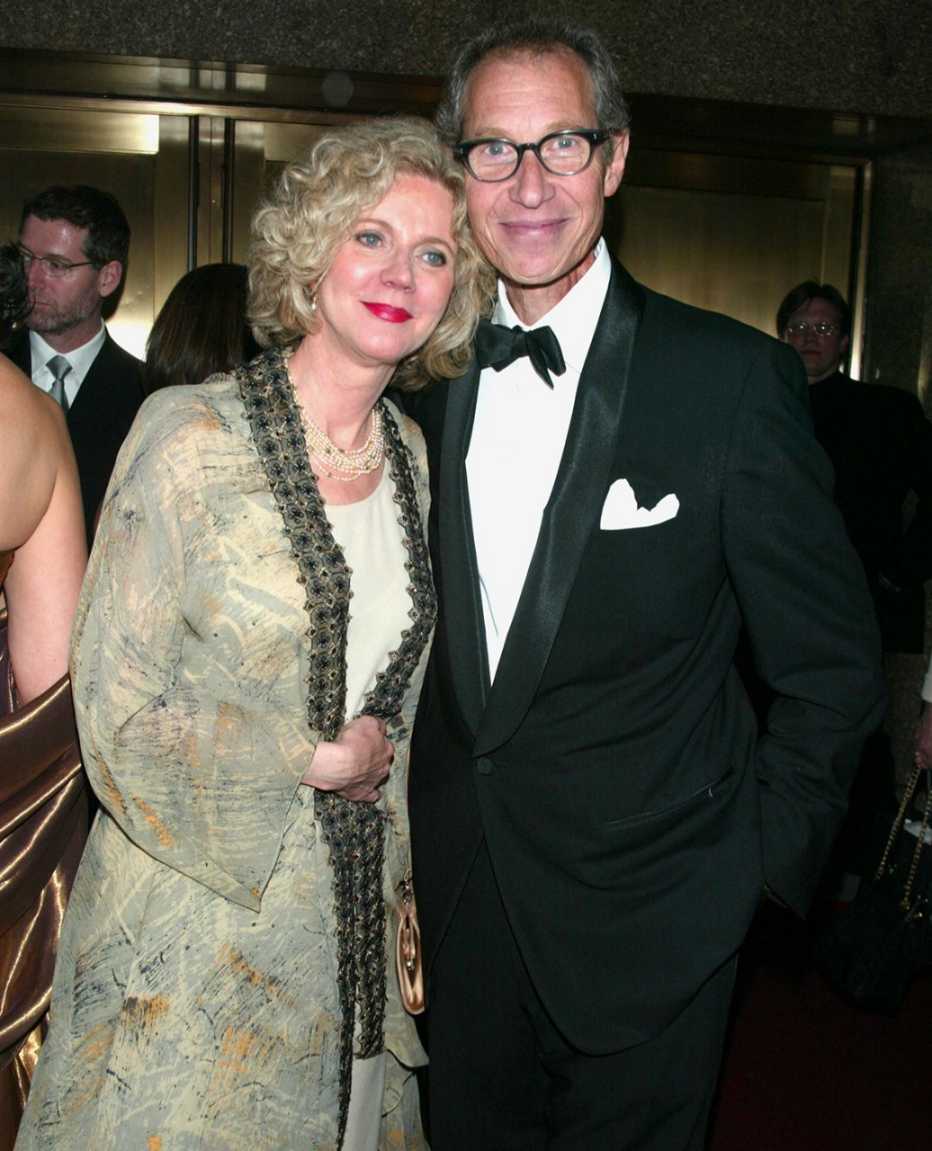 Blythe Danner with her arm around Bruce Paltrow.