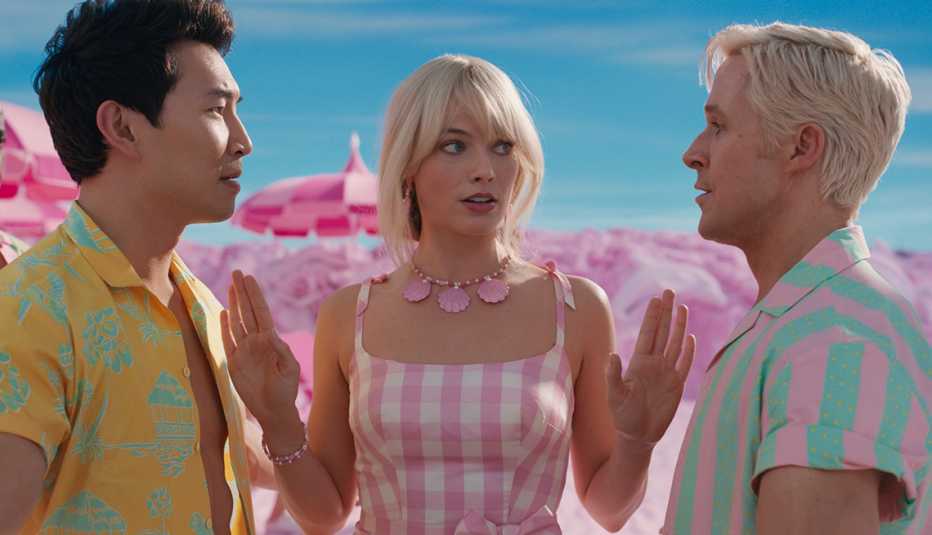 simu liu, margot robbie and ryan gosling in a still from barbie
