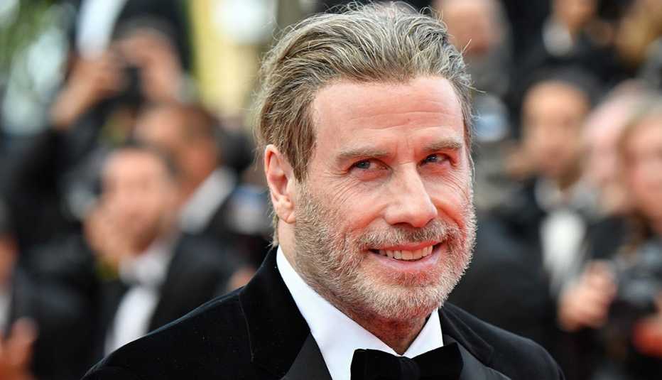 John Travolta wearing a tux.