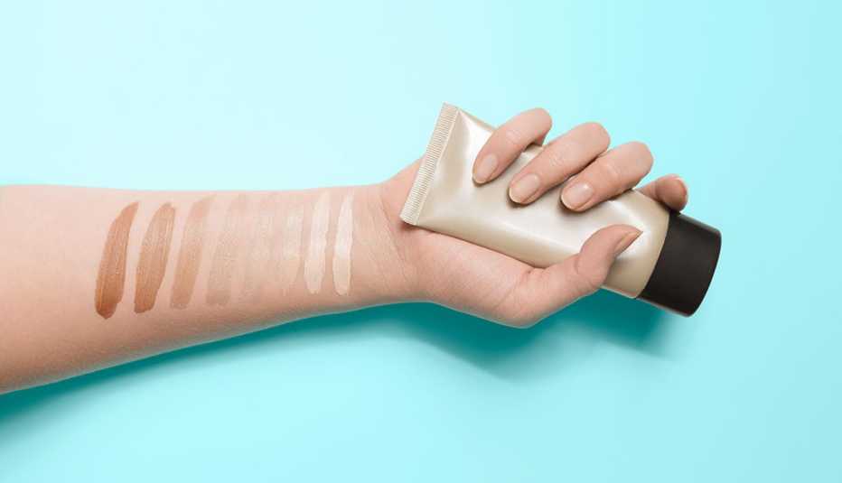 shades of foundation on a woman's arm