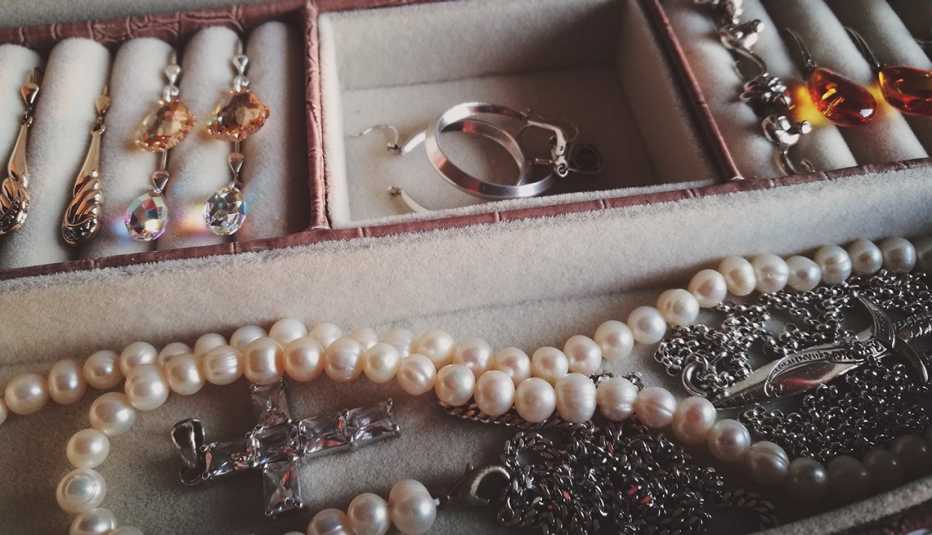 Earrings, necklaces and other jewelry in box