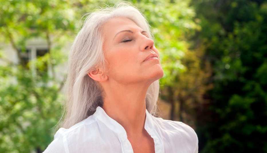 Woman enjoying the fresh air outdoors
