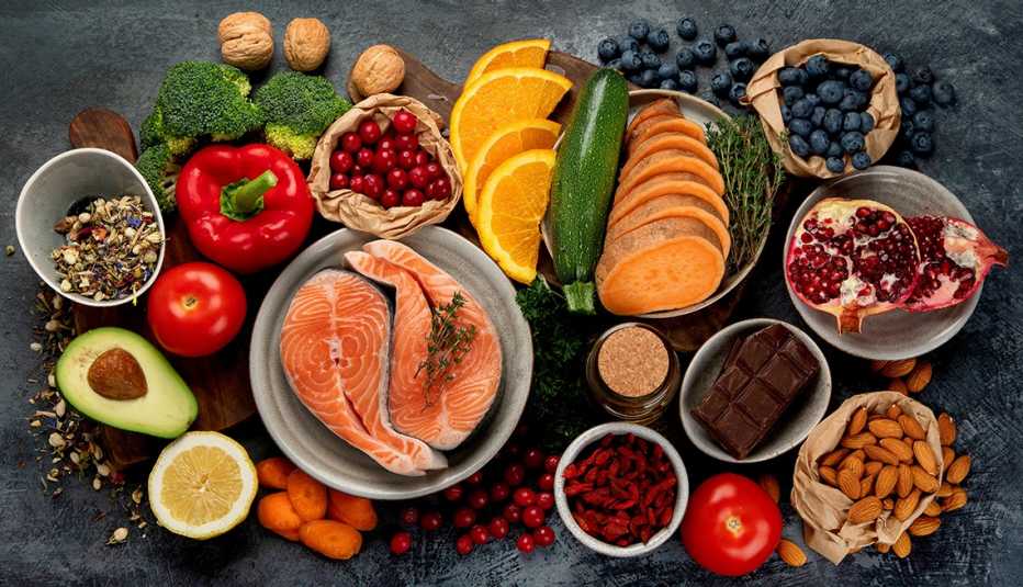 Assorted fruits vegetables fish and nuts