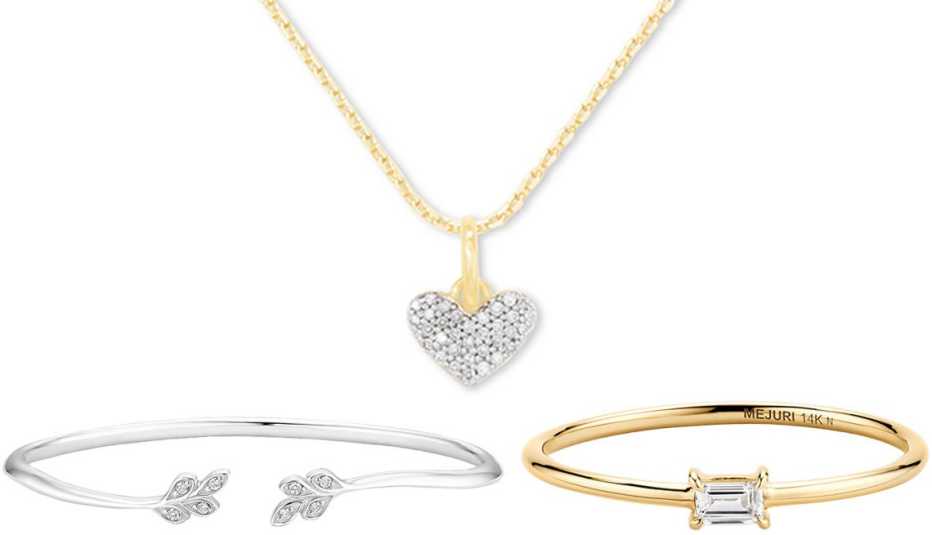 Brilliant Earth Silver Juniper Diamond Cuff Bracelet; Kendra Scott Avi Pave Heart 18k Yellow Gold Vermeil Charm Necklace in White Diamond; Mejuri Baguette Diamond Stacker Ring in 14k Yellow Gold, Diamond