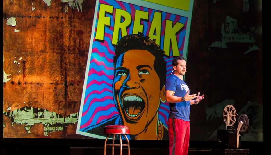 john leguizamo on stage performing his one man show ghetto klown