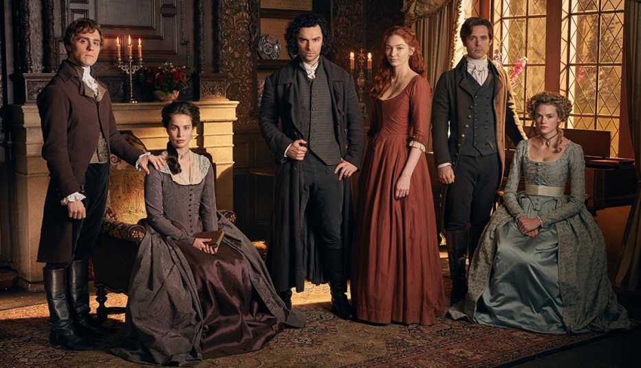 Shown from left to right: Jack Farthing as George Warleggan, Heida Reed as Elizabeth, Aidan Turner as Ross Poldark, Eleanor Tomlinson as Demelza, Luke Norris as Dr. Dwight Enys and Gabriella Wilde as Caroline Penvenan