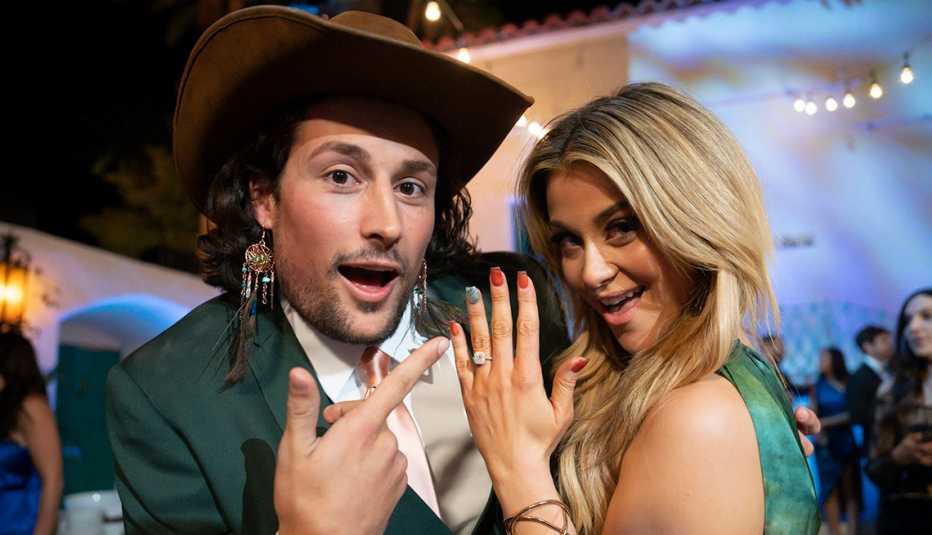 Brayden Bowers and Christina Mandrell shows off a ring after he proposes to her at "The Golden Wedding."