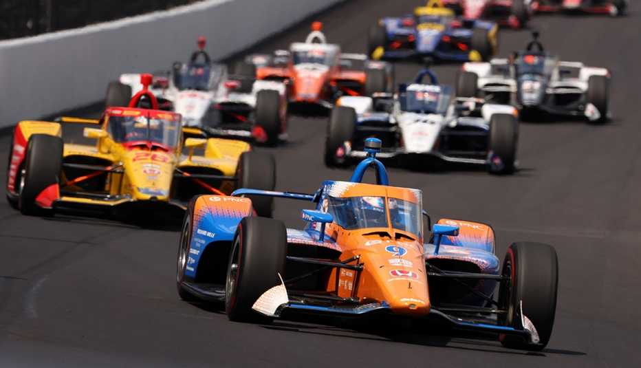Race cars on the track during the 104th running of the Indianapolis 500