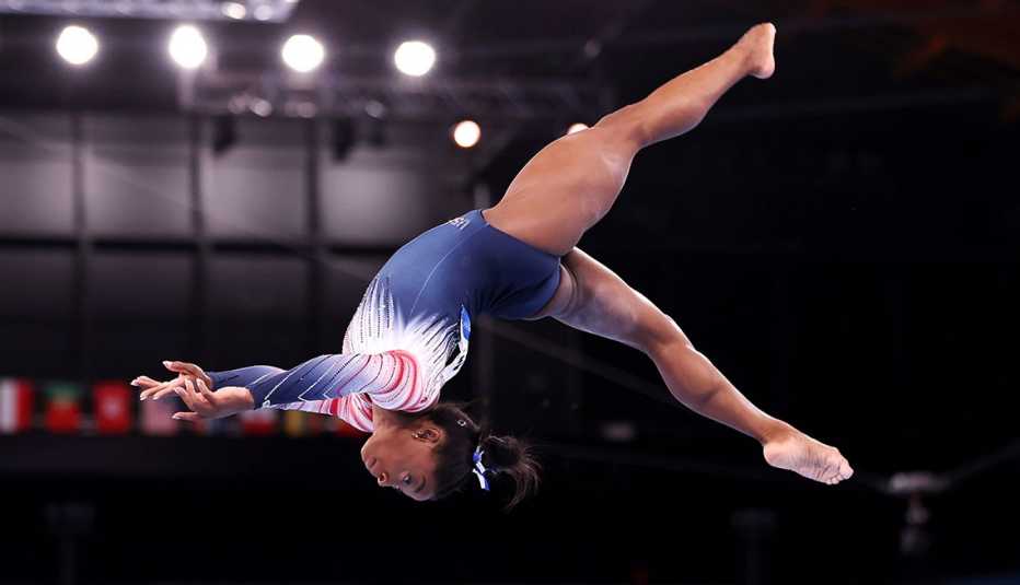 simone biles of team united states competing in the tokyo twenty twenty olympic games