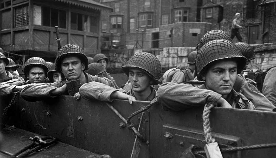 American troops being ferried to larger ships in preparation for the allied invasion of Normandy.