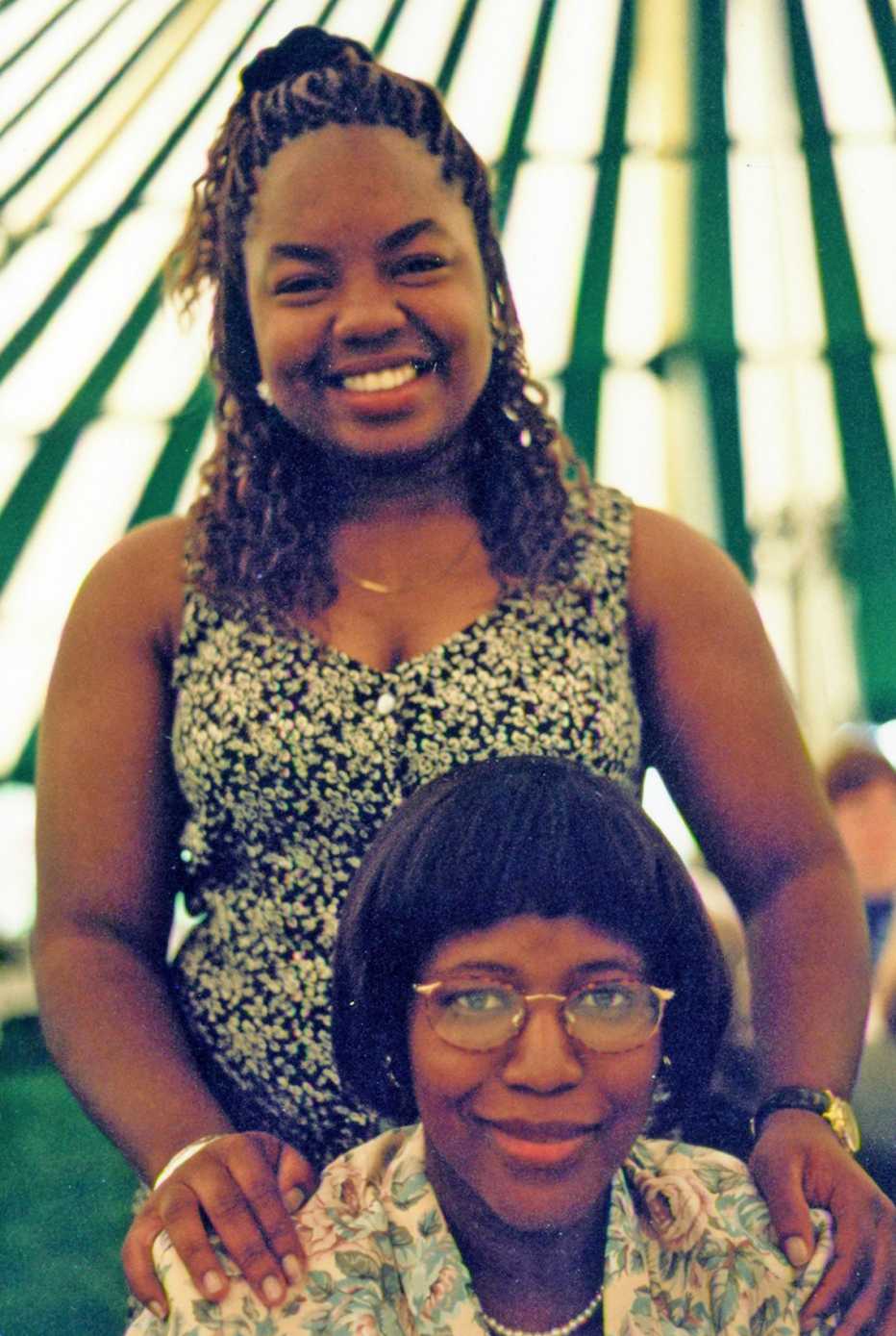 two women with paula edgar standing behind her mother donna joan griffith who is seated 
