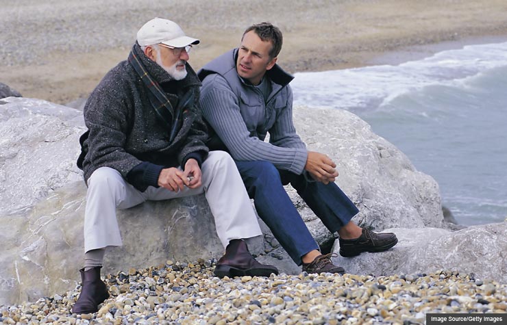 Father and son talking, Inheritance Etiquette (Image Source/Getty Images)