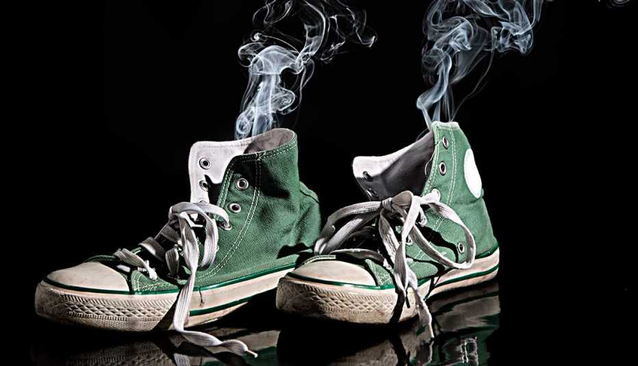 Smoke rising from basketball shoes, Yuck Factor Facts Fix Act Now Stinky Feet
