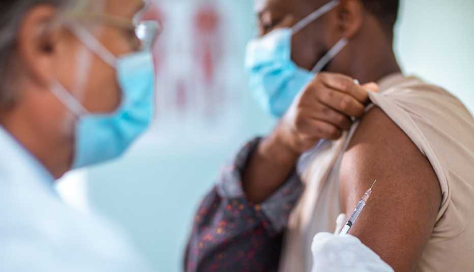 close-up of a person getting a vaccine injection 