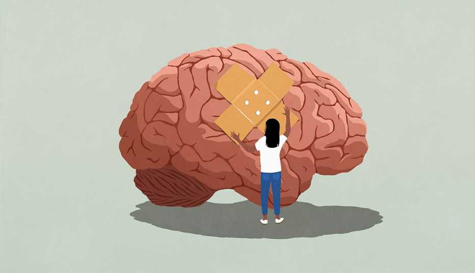 woman placing bandage on brain injury