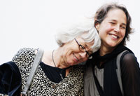 Portrait of a younger and older woman smiling illustrates story about a drug for alzheimer's disease