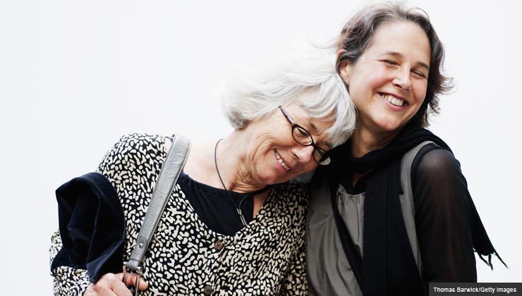 Portrait of a younger and older woman smiling illustrates story about a drug for alzheimer's disease