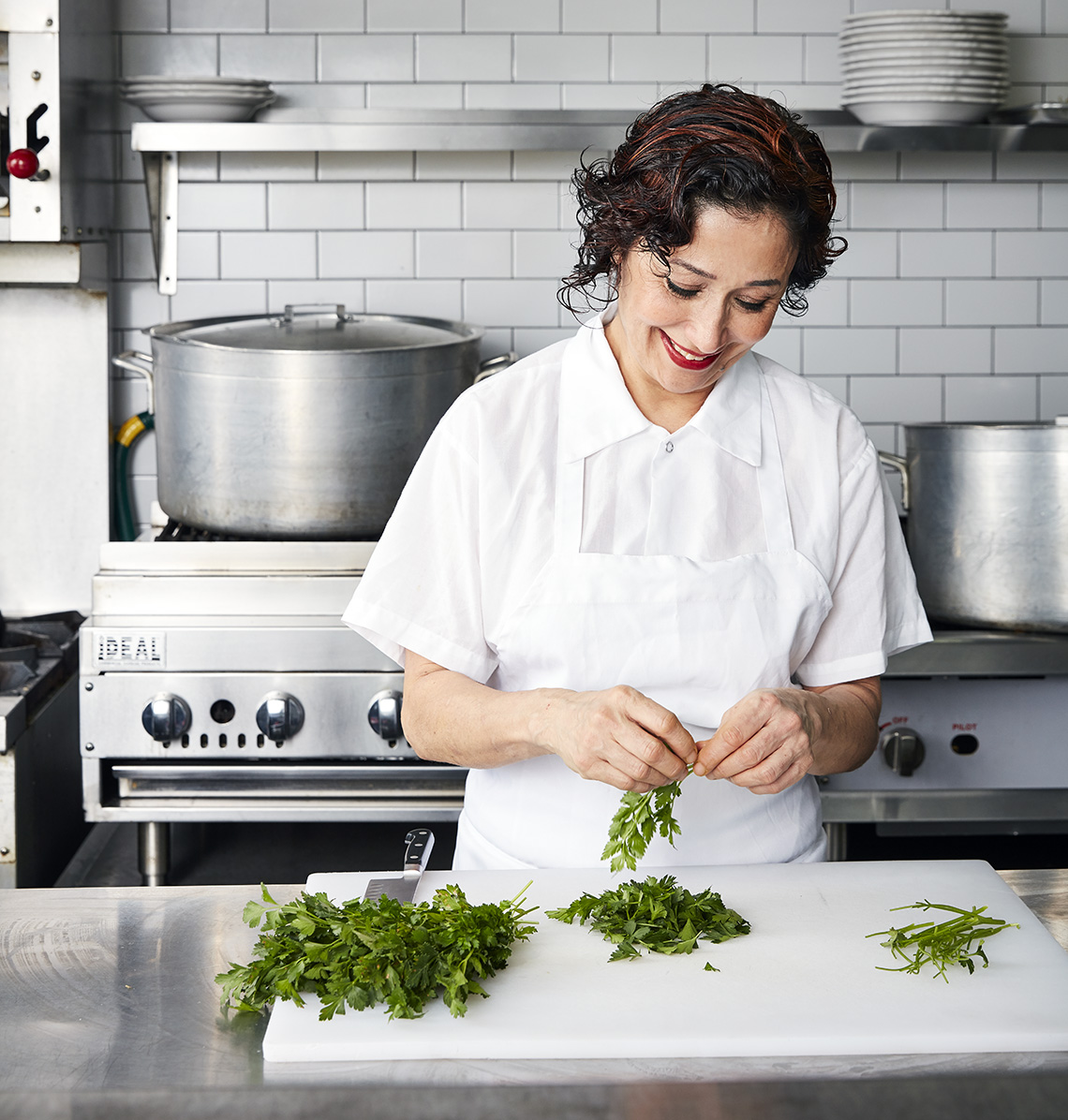 Chef Nasim Alikhani prepares a middle eastern dish.