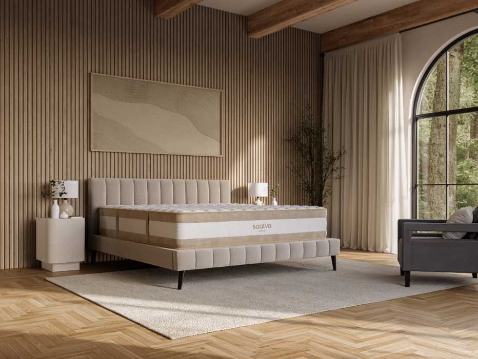 The Saatva Rx mattress on display in a bedroom.