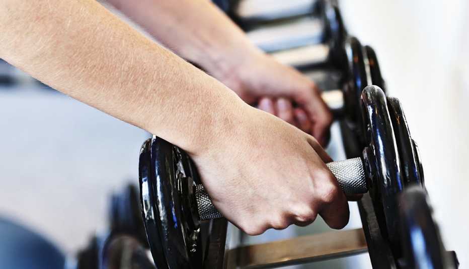 Female hands, weights, Personal Best: My Fitness