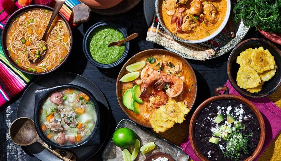 clockwise from top right soups moqueca then asopao then caldo de frijoles then cuchuco then sopa de fideos