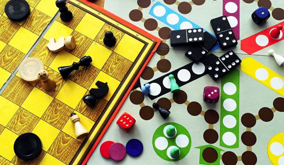 A photo collage of game board and game pieces.