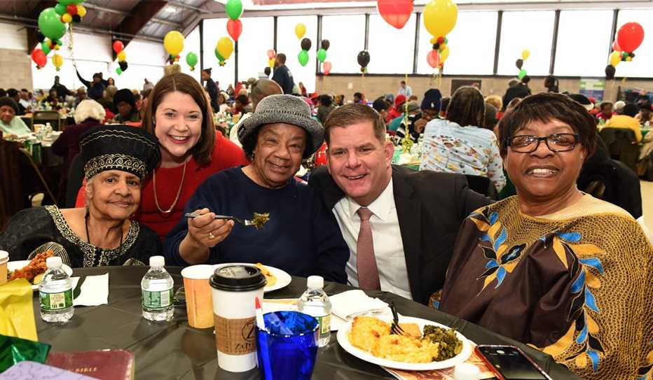 Emily Shea (far right) and Boston Mayor Martin Walsh (second from right) at a senior citizen event