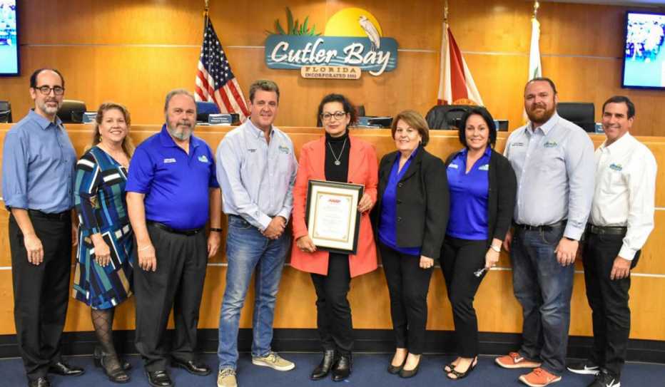 Local officials in Cutler Bay, Florida, pose with their AARP age-friendly network certificate