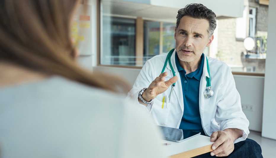 doctor talking with patient