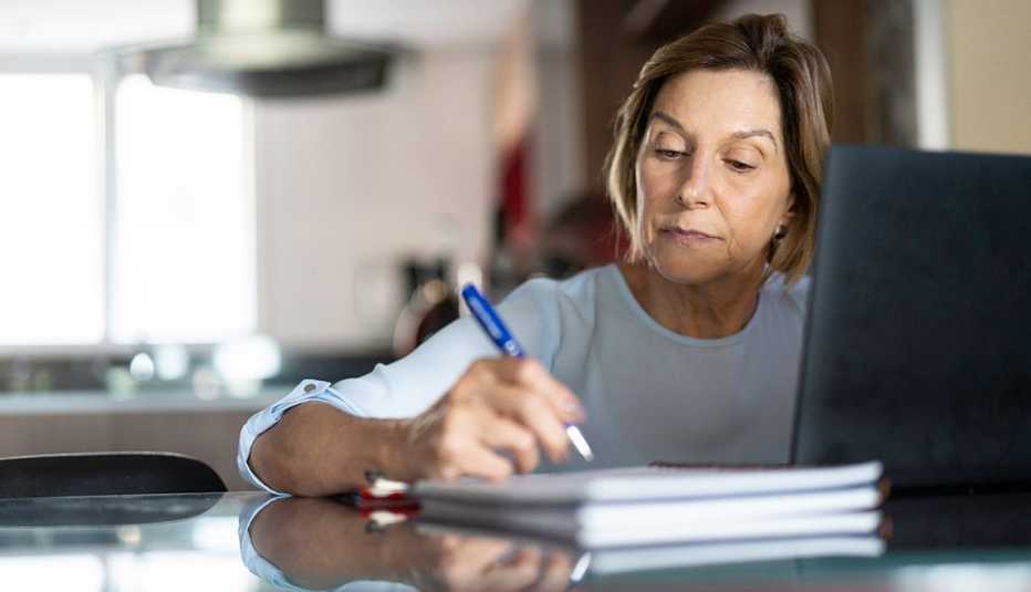 Mature woman doing home office
