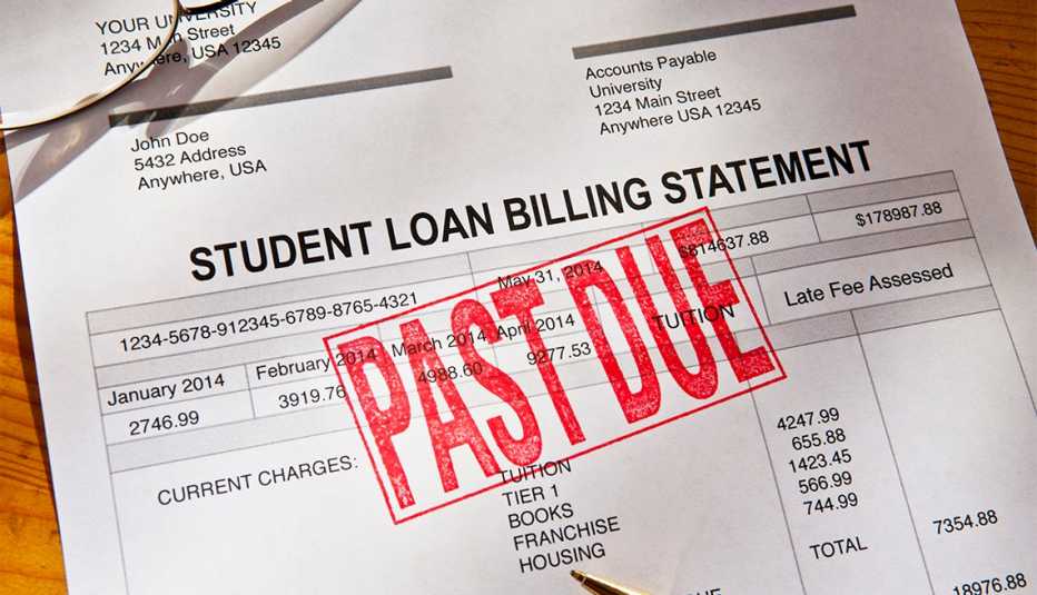 Statement for a past due student loan on a desktop.  