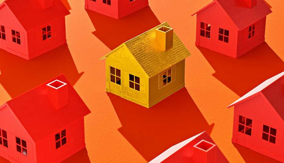 group of houses all tinted red but one is yellow