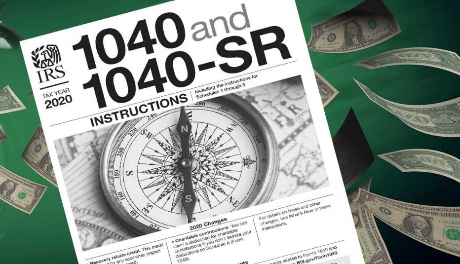 IRS instructions to claim stimulus on 2020 taxes sits on a background of green dollar bills
