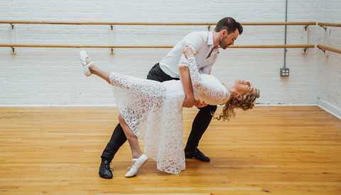 a man and a woman dancing