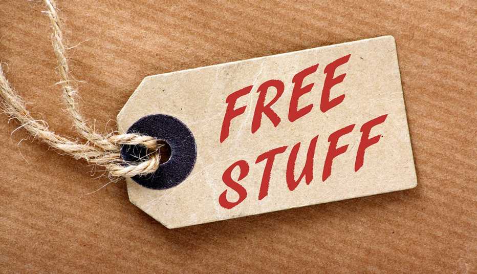 old-fashioned cardboard price tag with "Free Stuff" written in red marker 