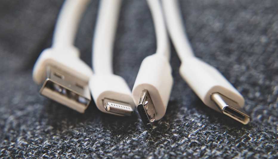 from left to right are shown an original u s b type a connector a lightning connector used with apple products a micro u s b connector and finally a u s b c connector