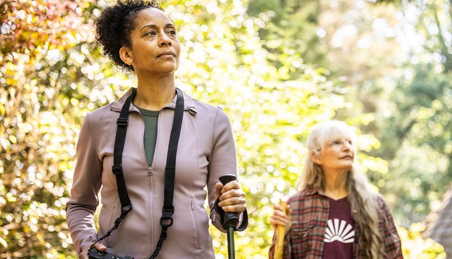 Senior women hiking in forest